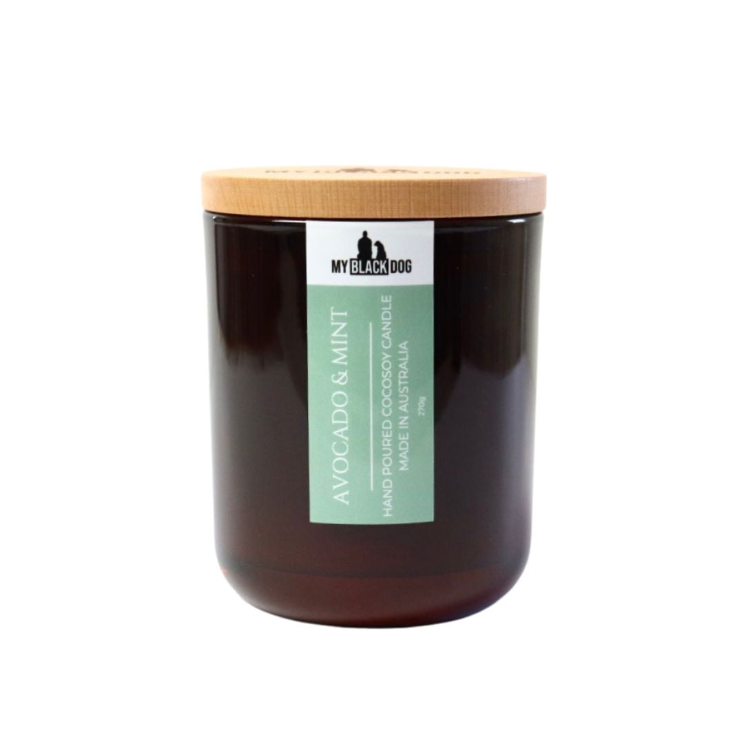 My Black Dog Avocado & Mint CocoSoy Candle in an amber jar with a timber lid