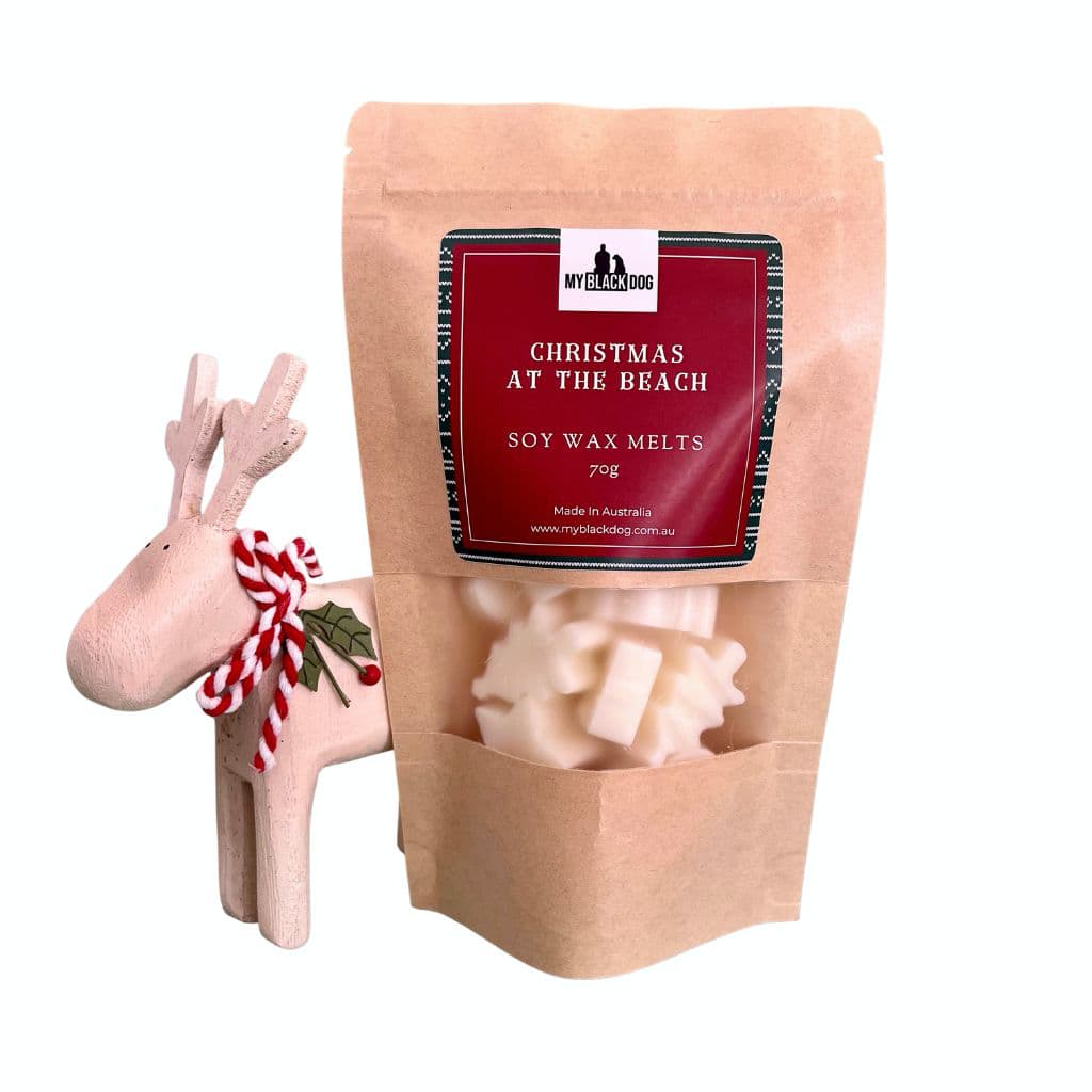Christmas at the beach soy wax melts in a bag with a toy reindeer