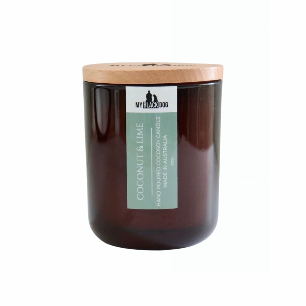 My Black Dog Coconut & Lime CocoSoy Candle in an amber jar with a natural lid