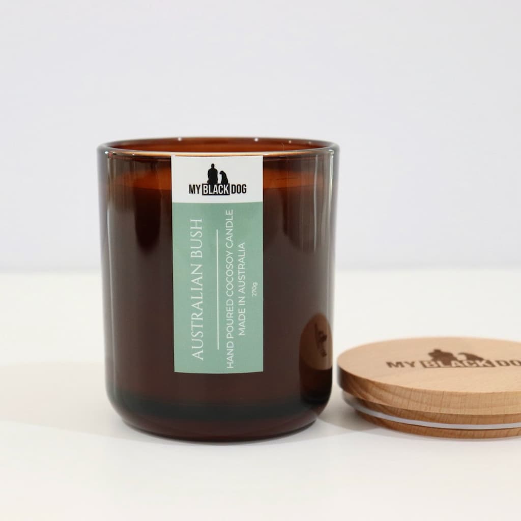 My Black Dog Australian Bush CocoSoy Candle in an amber jar with a natural timber lid