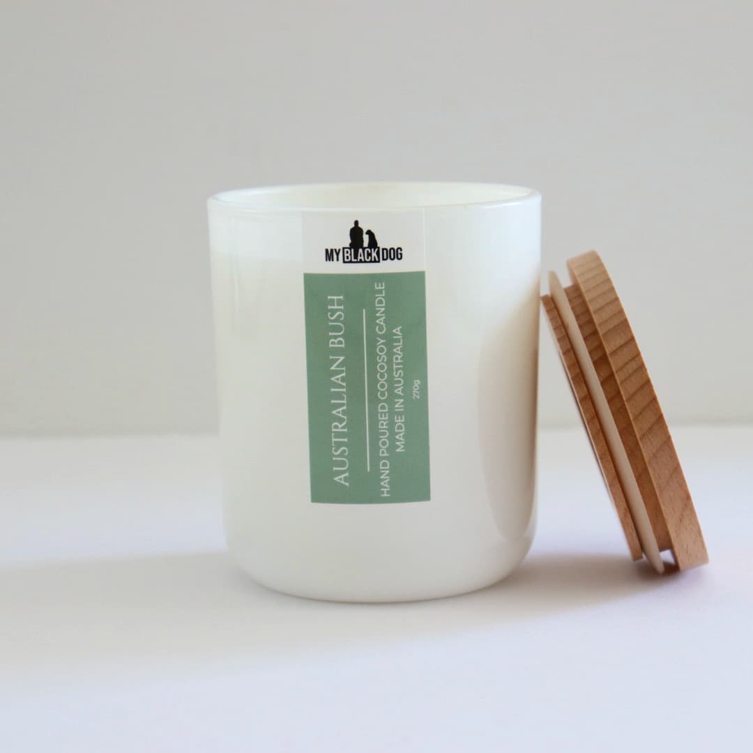 My Black Dog Australian Bush Scented CocoSoy Candle in a white jar with timber lid