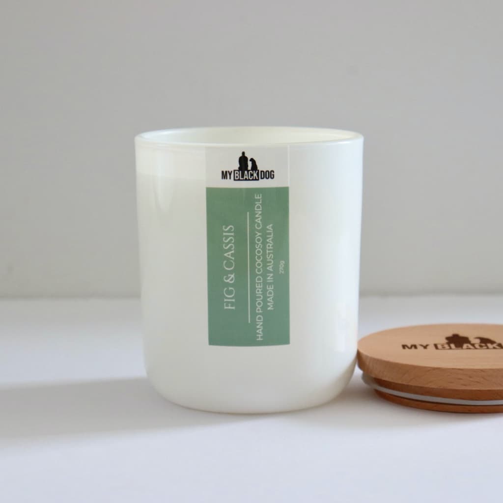 My Black Dog Fig & Cassis CocoSoy Candle in a white jar with timber lid