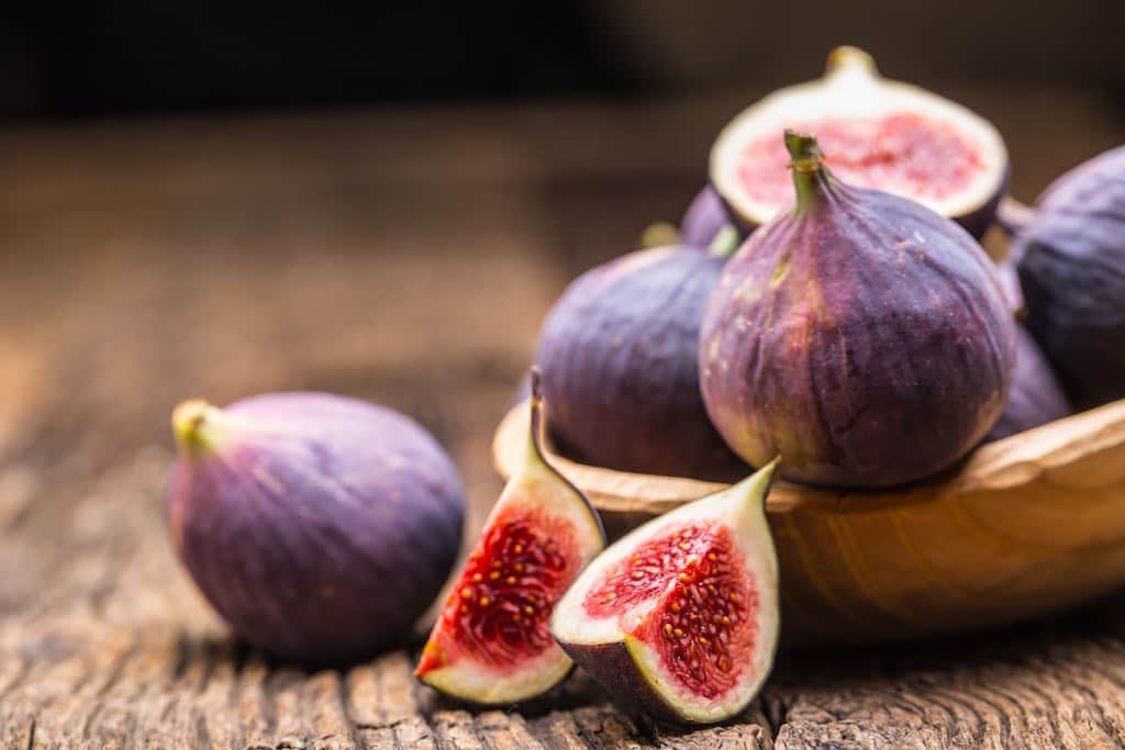 Figs in a bowl and cut figs