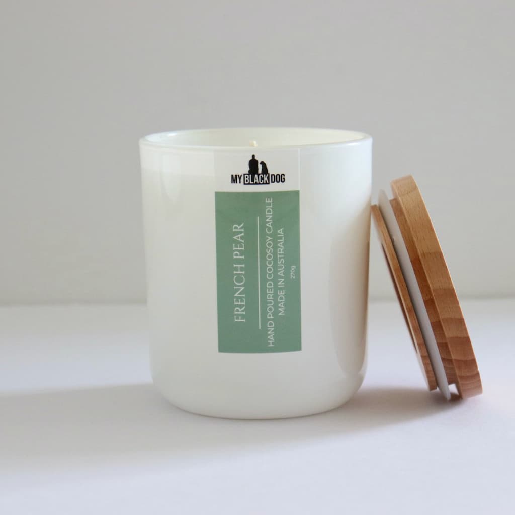 My Black Dog French Pear CocoSoy Candle in a white jar with timber lid