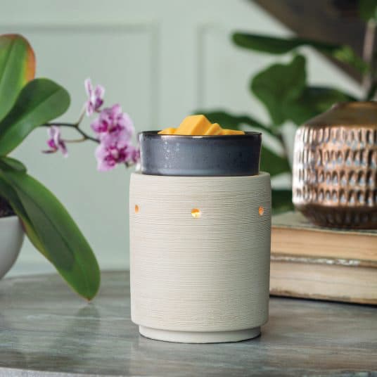 Iron & Clay Illumination Wax Melt Warmer sitting on table