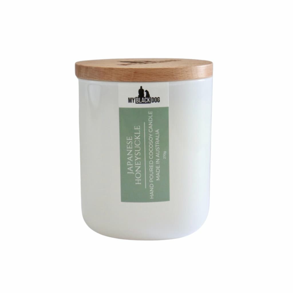My Black Dog Japanese Honeysuckle CocoSoy Candle in a white jar with timber lid