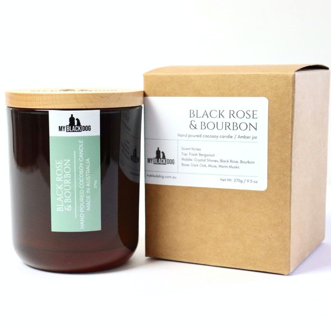 My Black Dog Black Rose & Bourbon CocoSoy Candle in an amber jar with box