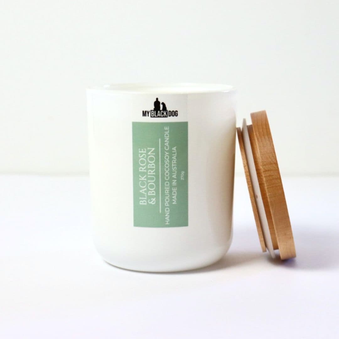 My Black Dog Black Rose & Bourbon CocoSoy Candle in a white jar with timber lid