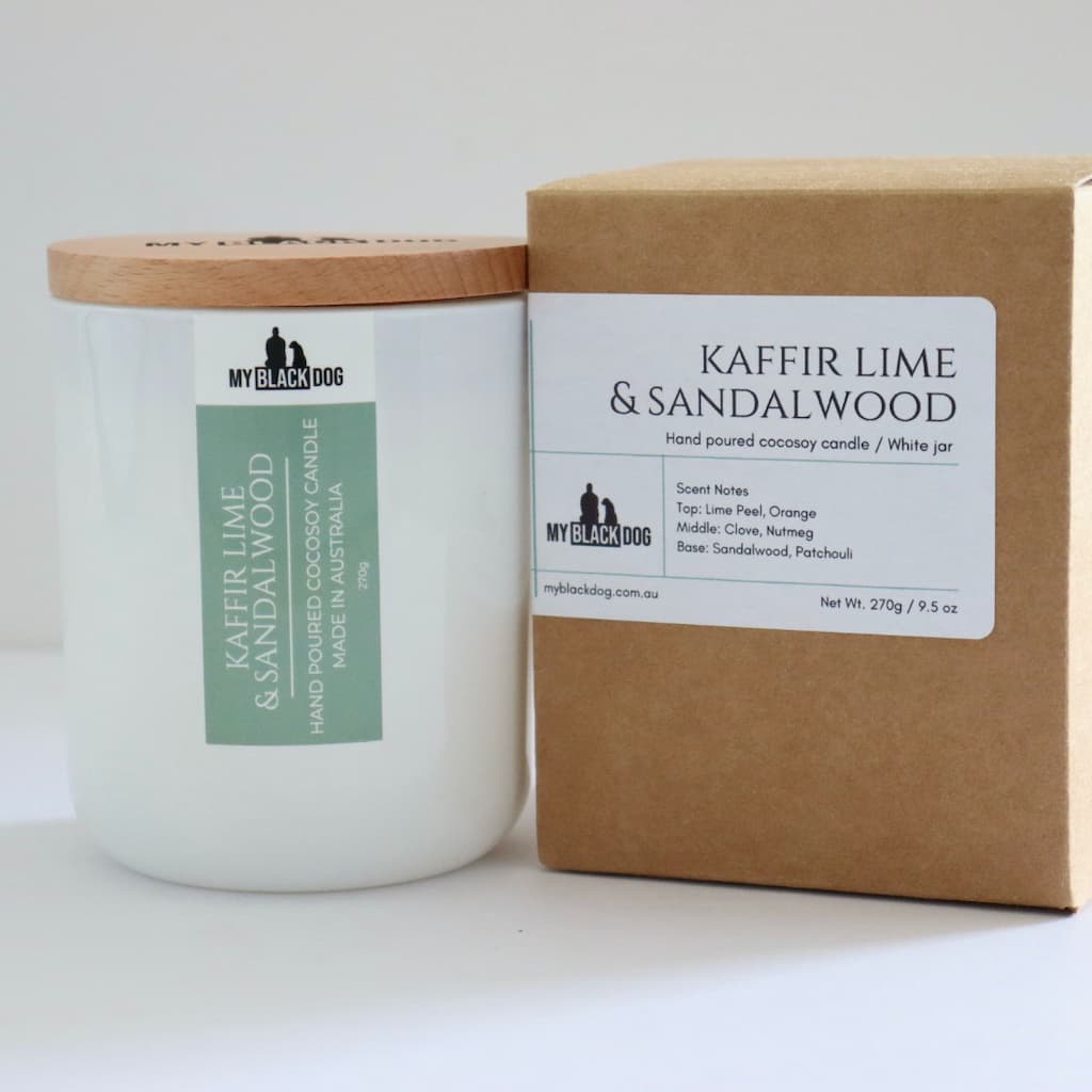 My Black Dog Kaffir Lime & Sandalwood CocoSoy Candle in a white jar with natural timber lid and box