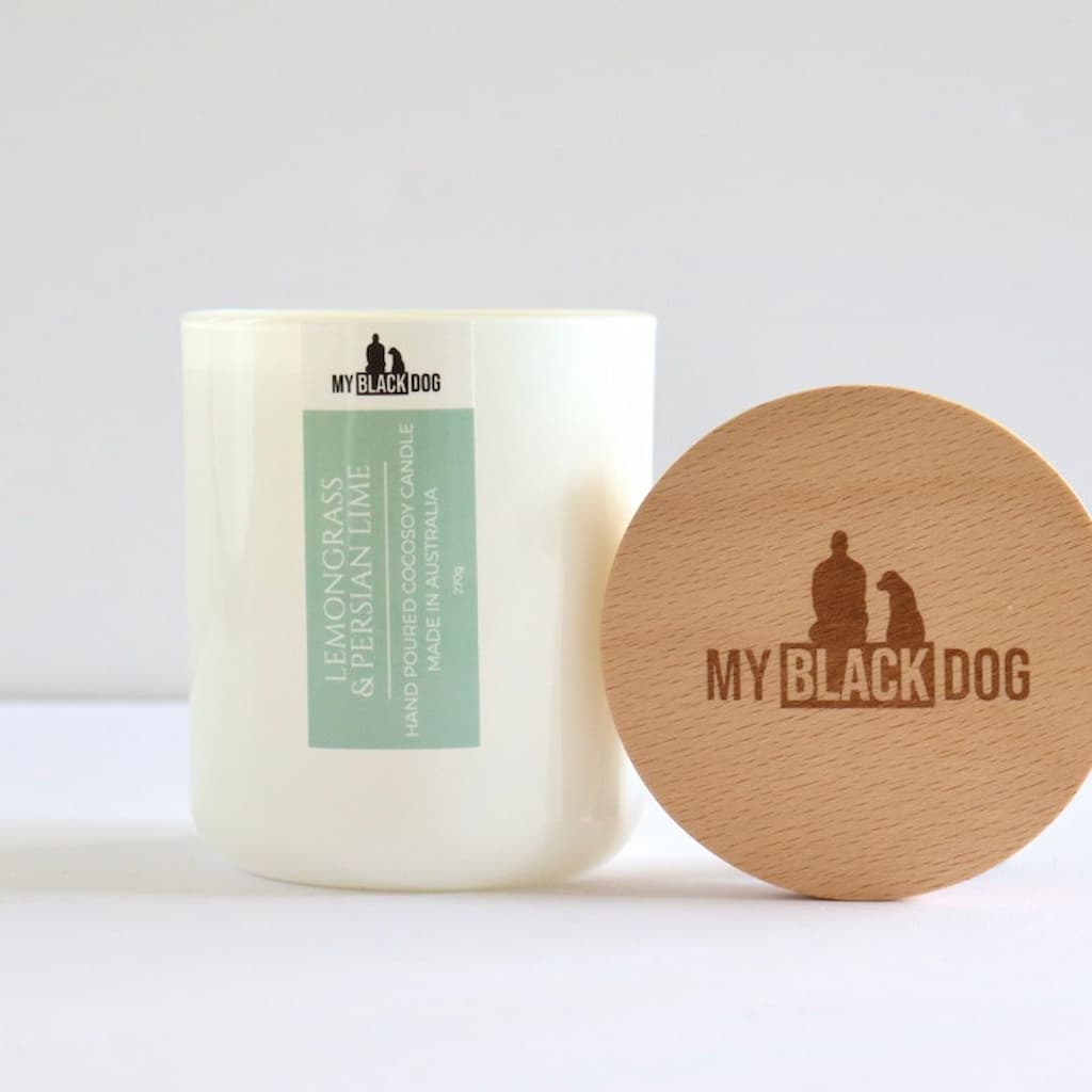 My Black Dog Lemongrass & Persian Lime CocoSoy Candle in a white jar with wooden lid