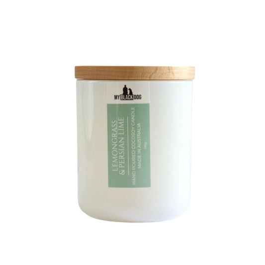 My Black Dog Lemongrass & Persian Lime CocoSoy Candle in a white jar with wooden lid