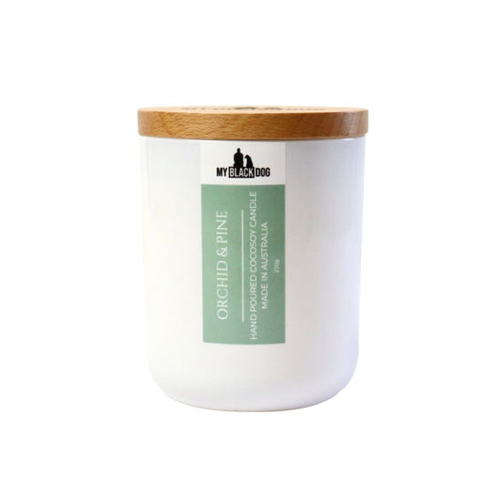 My Black Dog Orchid & Pine CocoSoy Candle in a white jar with timber lid