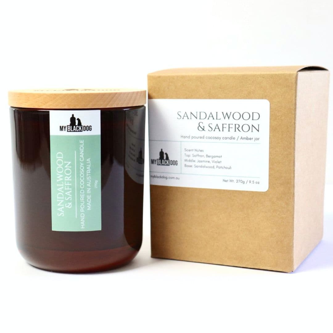 My Black Dog Sandalwood & Saffron CocoSoy Candle inn an amber jar with a box