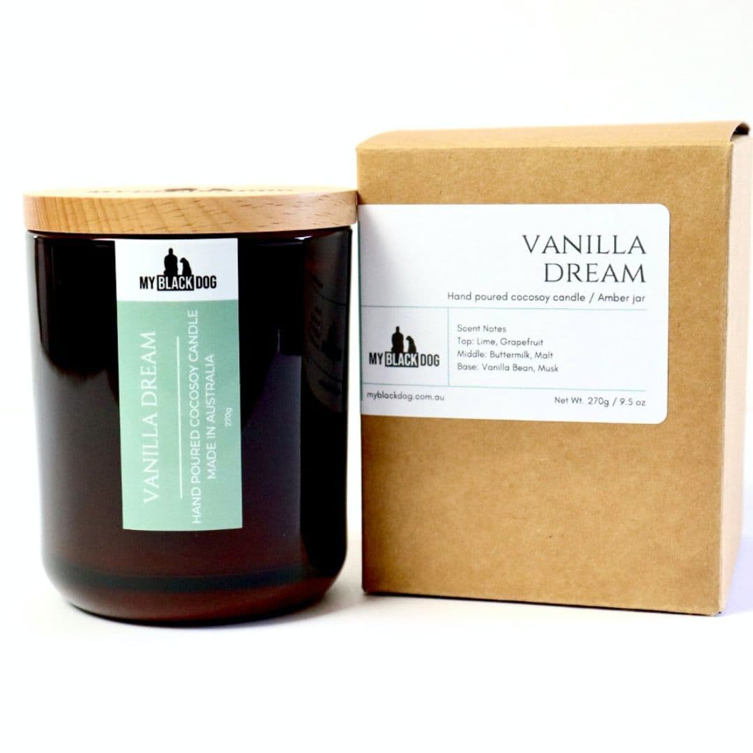 My Black Dog Vanilla Dream CocoSoy Candle in an amber jar with a box