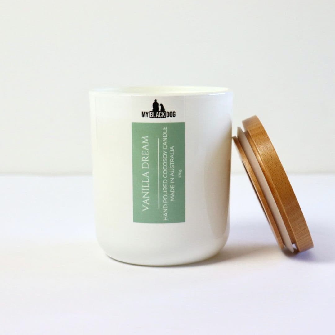 My Black Dog Vanilla Dream CocoSoy Candle in a white jar with a timber lid