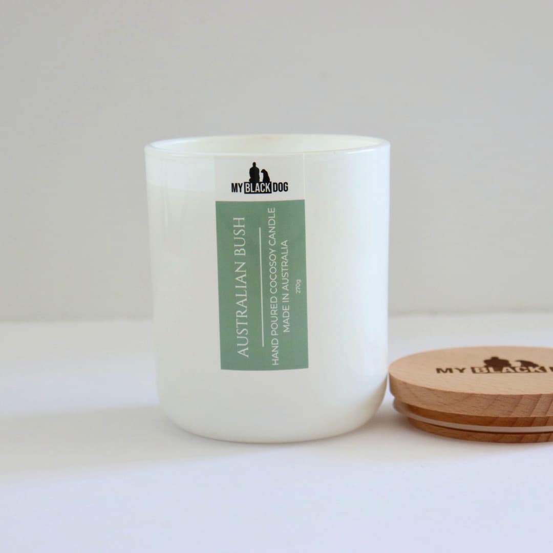 My Black Dog Australian Bush CocoSoy Candle in a white jar with timber lid