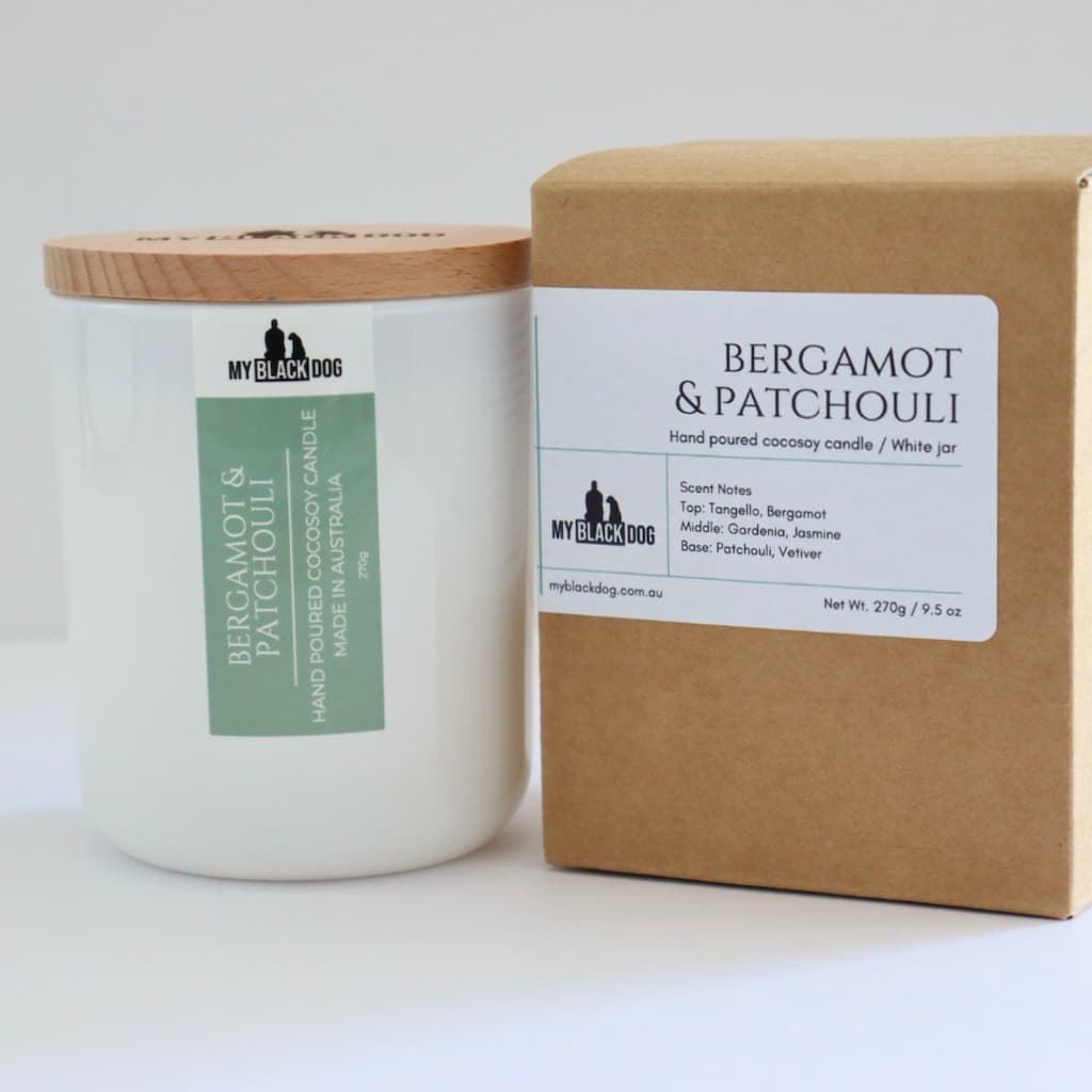 My Black Dog Bergamot & Patchouli CocoSoy Candle in a white jar with a timber lid and box