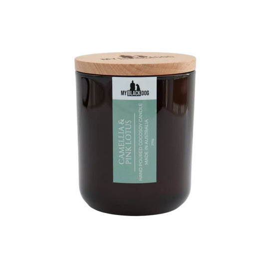 My Black Dog Camellia & Pink Lotus CocoSoy Scented Candle in an amber jar with timber lid