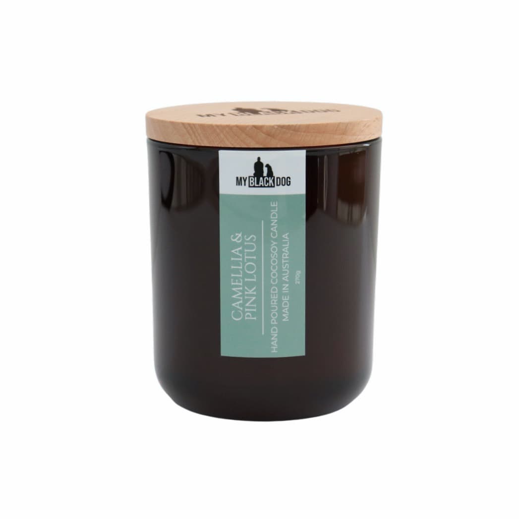 My Black Dog Camellia & Pink Lotus CocoSoy Scented Candle in an amber jar with timber lid