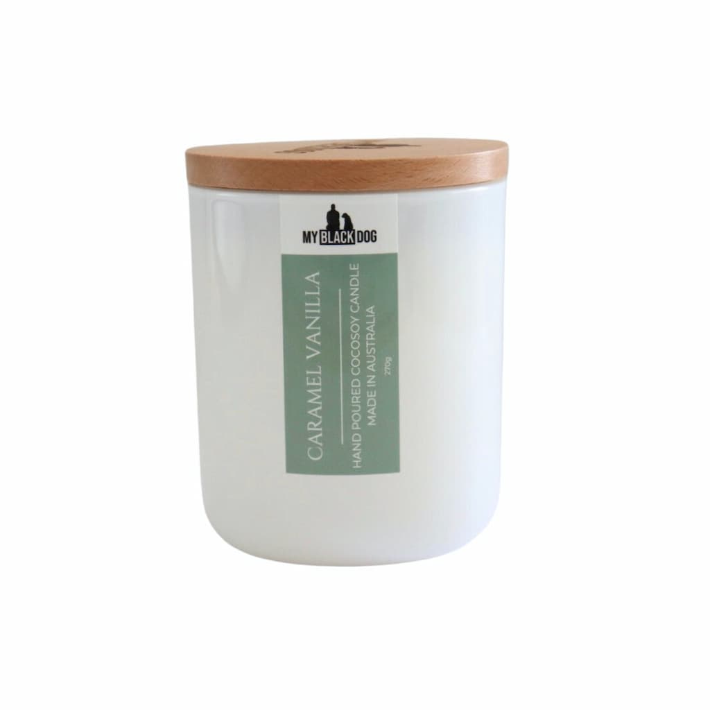 My Black Dog Caramel Vanilla CocoSoy Candle in a white jar with timber lid