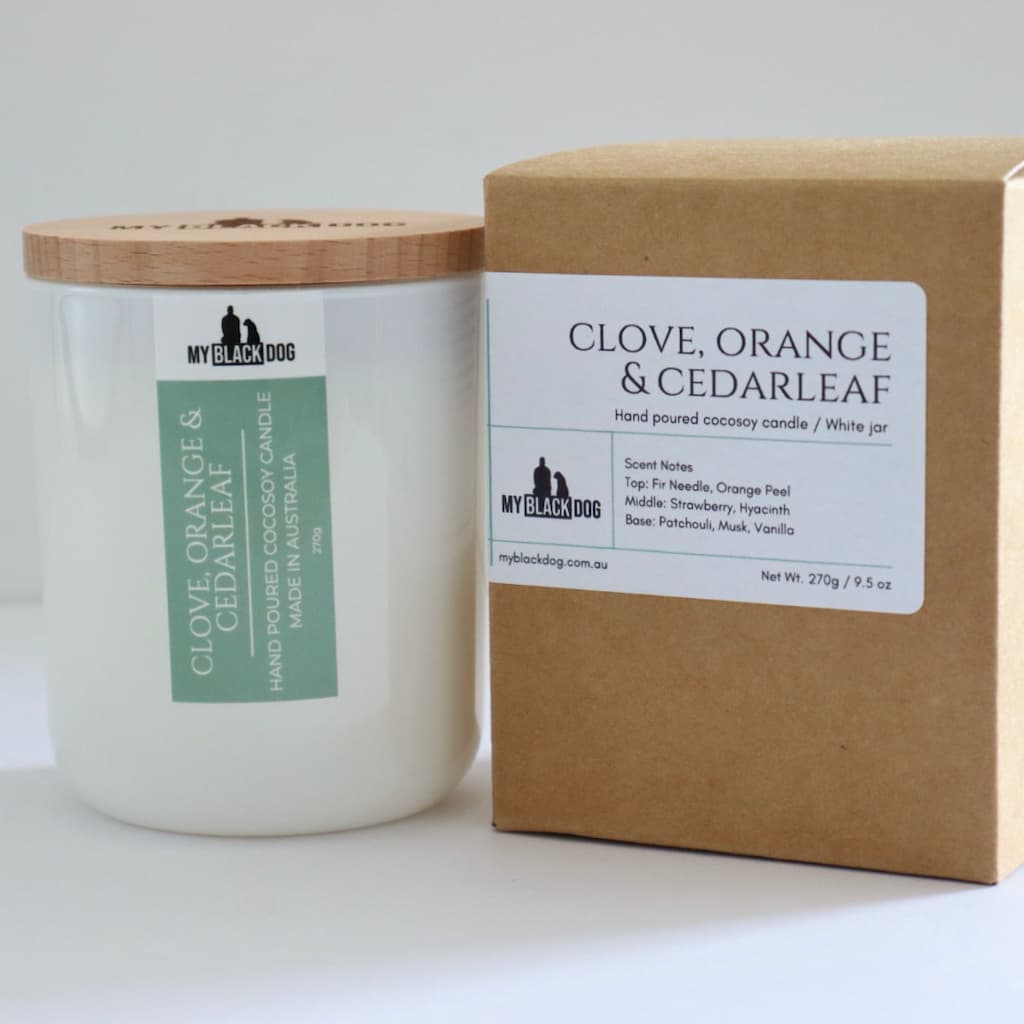 My Black Dog Clove, Orange & Cedarleaf CocoSoy Candle in a white jar with timber lid and box