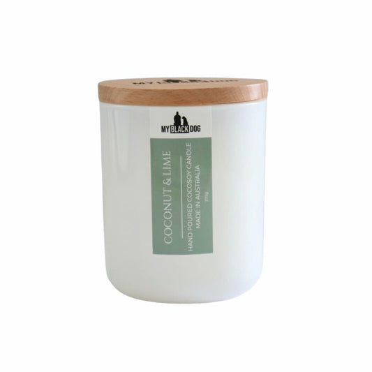 My Black Dog Coconut & Lime CocoSoy Candle in a white jar with natural timber lid