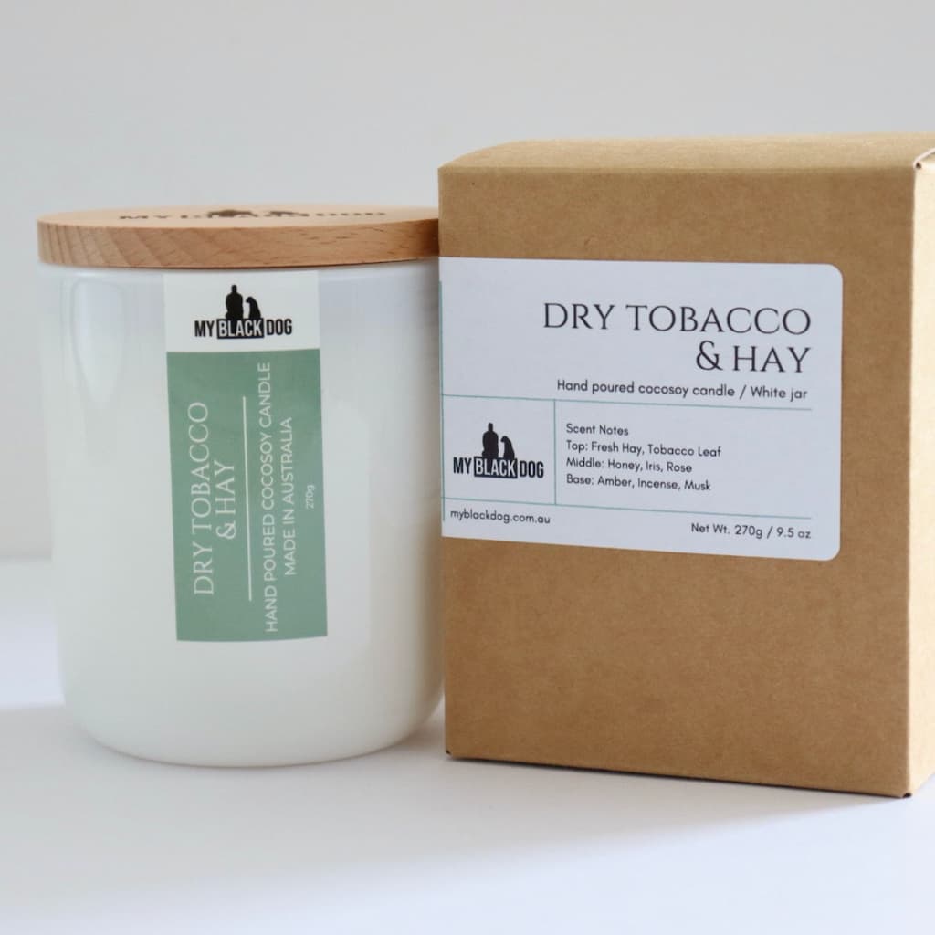 My Black Dog Dry Tobacco & Hay CocoSoy Candle in a white jar with timber lid and box