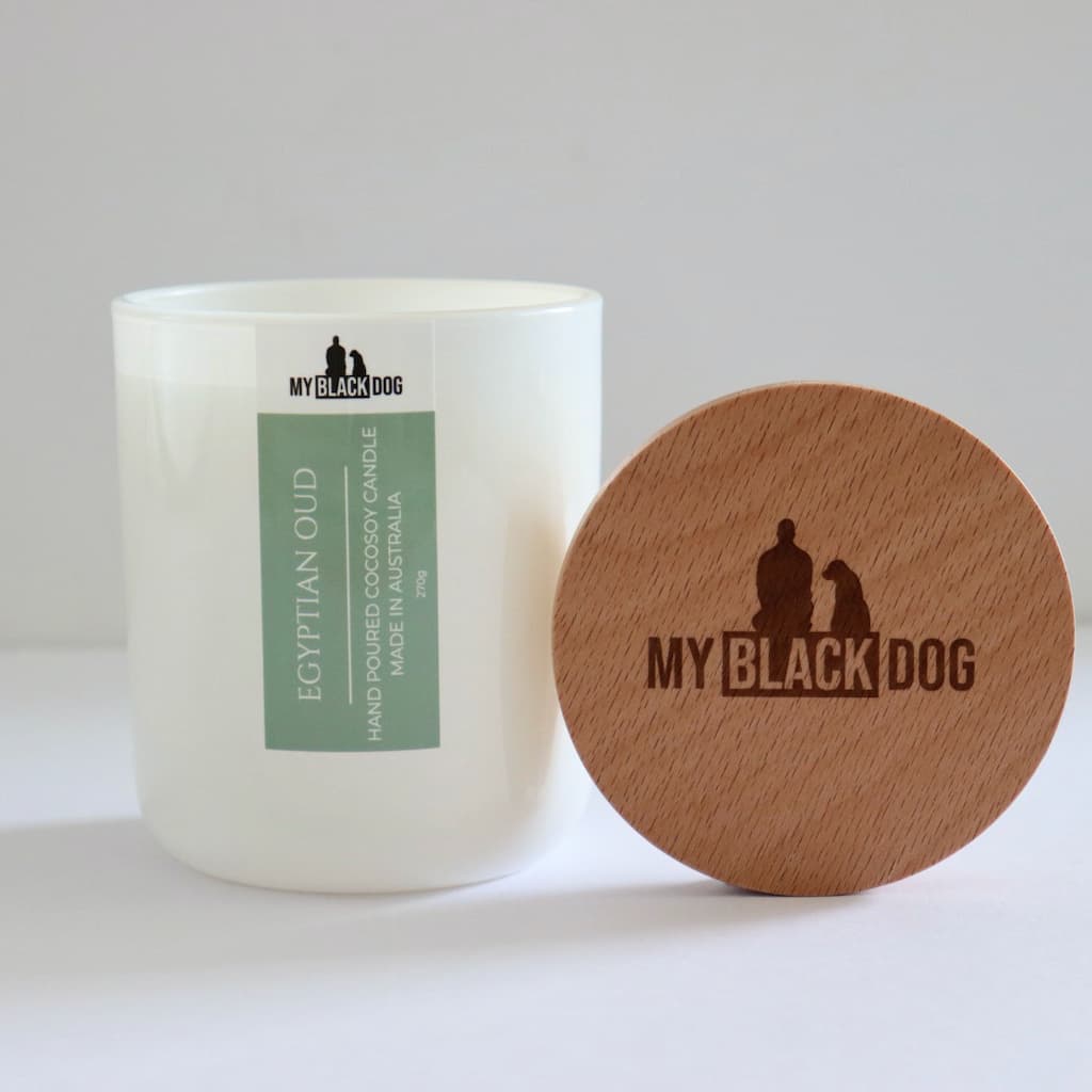 My Black Dog Egyptian Oud CocoSoy Candle in a white jar with timber lid