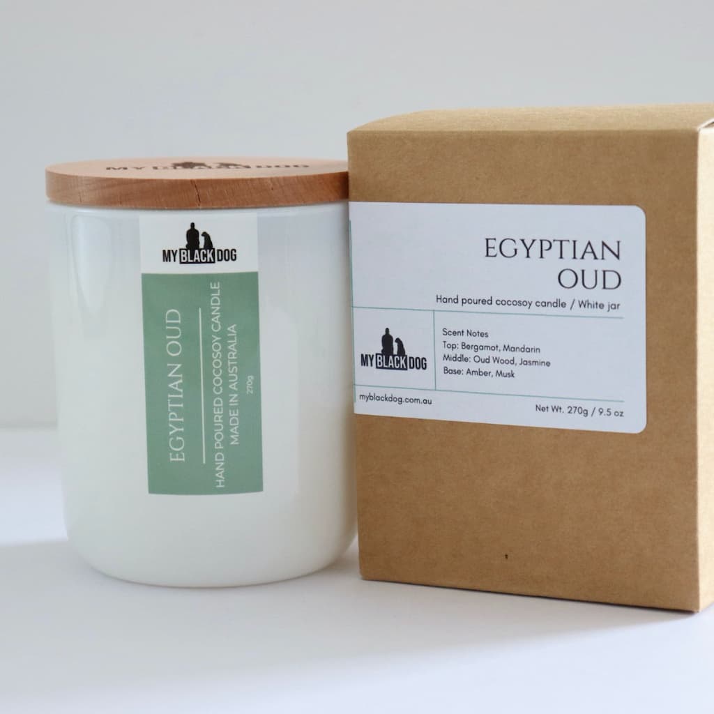 My Black Dog Egyptian Oud CocoSoy Candle in a white jar with timber lid and box