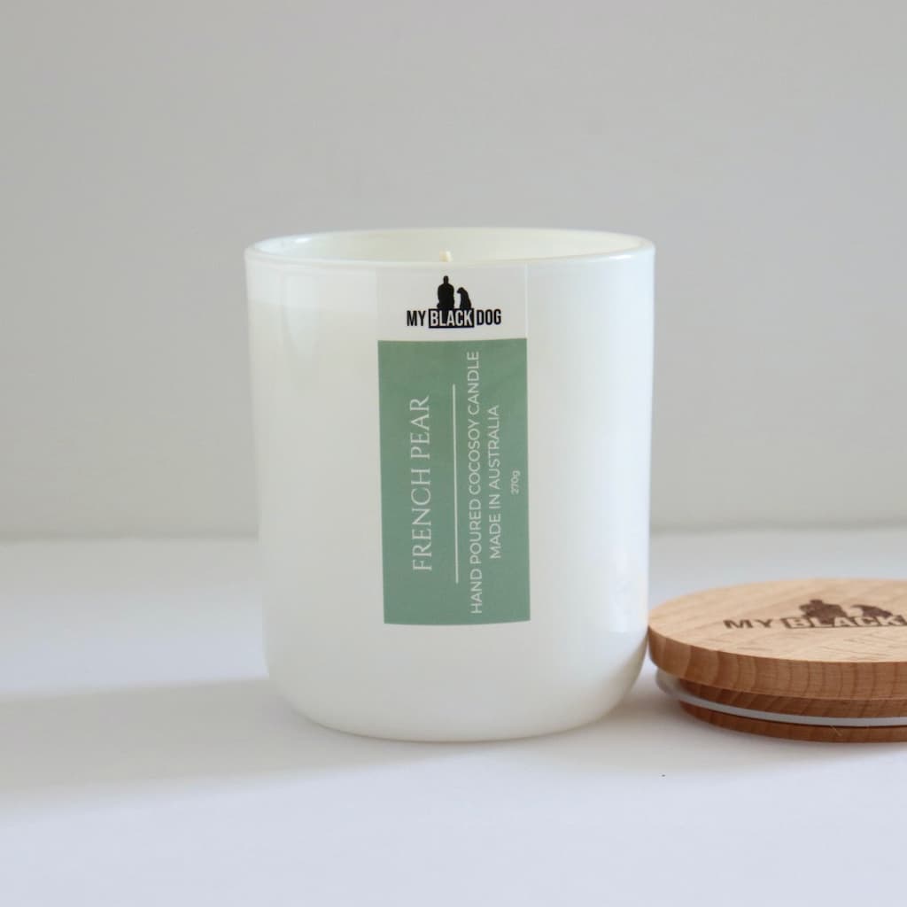 My Black Dog French Pear CocoSoy Candle in a white jar with timber lid