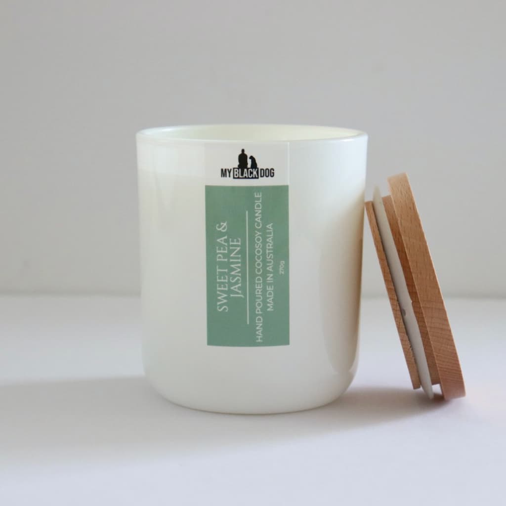 My Black Dog Sweet Pea & Jasmine CocoSoy Candle in a white jar with timber lid