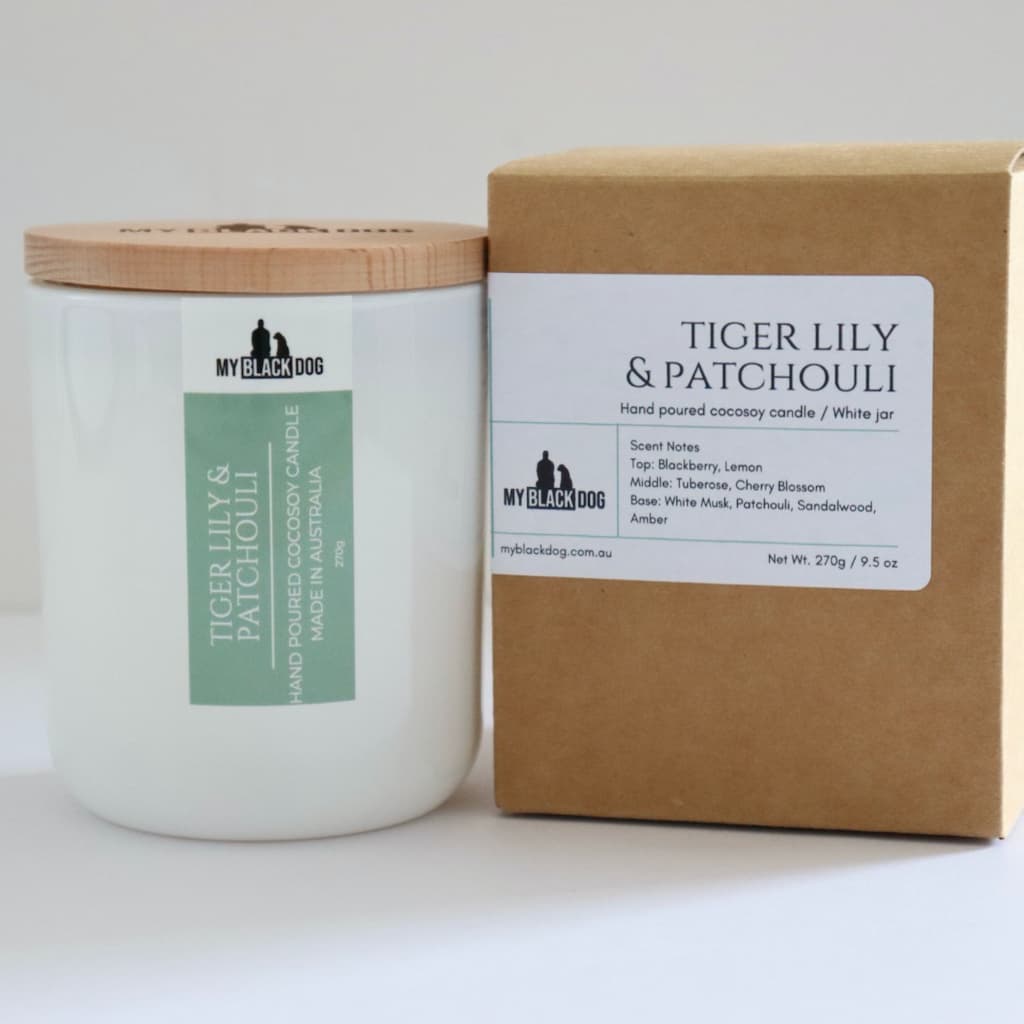 My Black Dog Tiger Lily & Patchouli CocoSoy Candle in a white jar with timber lid and box